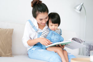 mother reading with daughter